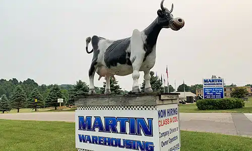 Martin Warehousing Cow Sign